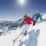 austria-salzburg-young-couple-skiing-on-mountain-2023-11-27-04-50-53-utc-150x150.jpg
